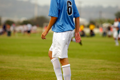 boy soccer player on field