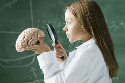 girl looking at brain